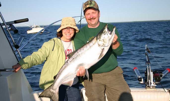 Great Reel Action King Salmon and big smiles all around.